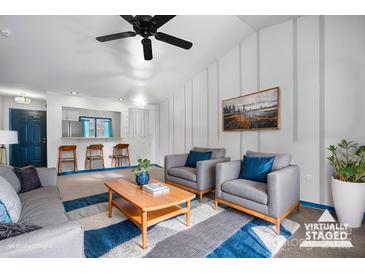 Bright living room features modern decor, stylish furniture, and lots of natural light at 413 19Th Avenue Ne Ct, Hickory, NC 28601