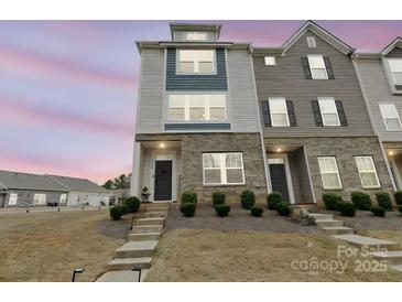Well maintained exterior facade with brick detail, landscaping and concrete steps at 8260 Waxhaw Hwy, Waxhaw, NC 28173