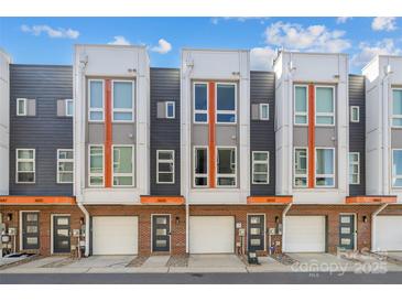 Modern townhome exteriors featuring sleek architectural design and attached garages, enhancing curb appeal at 3655 Vallette Ct, Charlotte, NC 28203