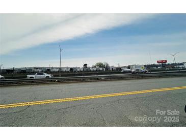 Commercial street with traffic at 3000 Dalecrest Dr, Charlotte, NC 28269