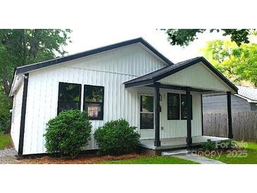 Charming home featuring a front porch and a well-maintained front yard at 621 Cauthen St, Rock Hill, SC 29730