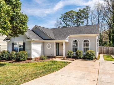 Charming single-story home with a well-manicured lawn and inviting front porch and driveway at 2518 Eargle Rd, Charlotte, NC 28269