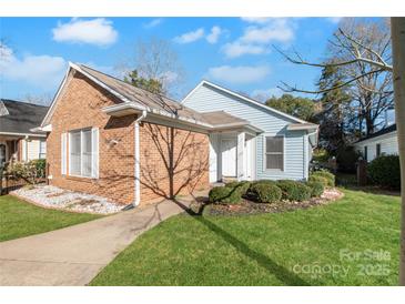 Charming one-story home with brick and siding exterior, landscaped yard, and a welcoming front entrance at 657 Heathridge Rd, Rock Hill, SC 29732