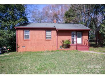 Charming single story brick house with a cozy front porch and well maintained lawn at 2825 Bancroft St # C, Charlotte, NC 28206