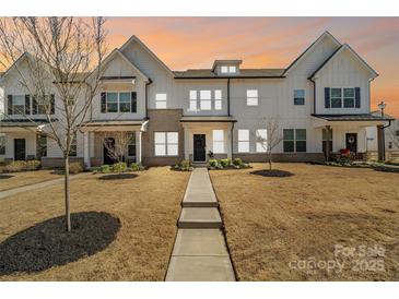 Charming townhome with modern farmhouse design and inviting walkway at 722 Herlong Ave, Rock Hill, SC 29732