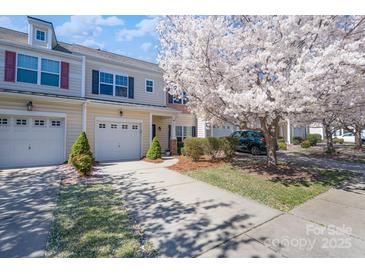 Charming townhouse with attached garage, blooming tree and inviting curb appeal at 623 Hicklin Dr, Rock Hill, SC 29732