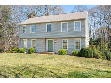 Charming two-story home with a well-maintained lawn and mature landscaping at 1008 High Wedge Rd, Shelby, NC 28152