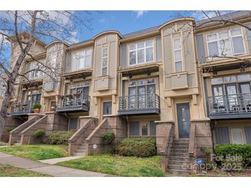 Charming townhome with dual-level exterior with private balconies at 840 Garden District Dr, Charlotte, NC 28202