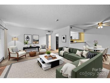 Bright living room featuring stylish furniture, modern decor, and an open layout at 1832 J Julian Ln # D, Charlotte, NC 28208