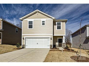Charming two-story home with a two-car garage and covered entryway at 816 Blue Canyon Dr, York, SC 29745