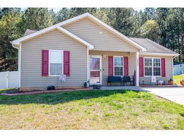 Charming one story home with red shutters and well-maintained lawn at 2401 Gelsinger Ave, Bessemer City, NC 28016