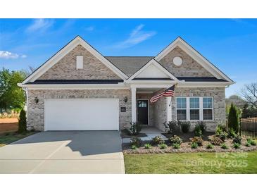 Charming single-Gathering home boasting a two-car garage and well-maintained lawn at 3054 Constitution Ln, Gastonia, NC 28056