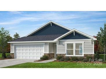 Charming single-story home featuring a two-car garage, stone accents, horizontal siding, and a shingled roof at 1018 Cunningham Farm Dr, Indian Trail, NC 28079