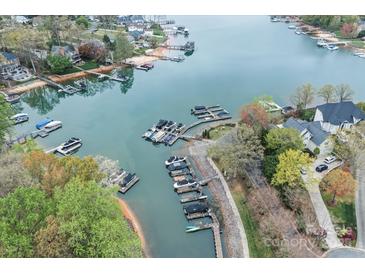 Aerial view of the community featuring lake access and private boat docks at 21721 Shoveller Ct, Cornelius, NC 28031