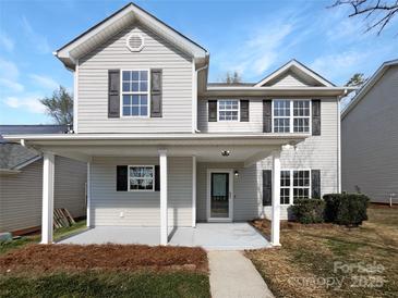 Charming two-story home with a covered front porch and inviting curb appeal at 3914 Hathaway Hills Dr, Charlotte, NC 28214