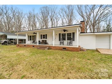 Charming single story home with a brick foundation and a covered front porch at 1197 Fincher Rd, Fort Lawn, SC 29714