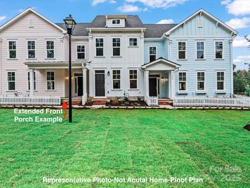 Charming townhomes with extended front porches and well-manicured lawns at 284 Gilead Rd, Huntersville, NC 28078