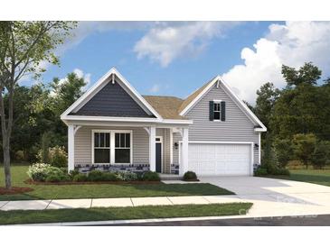 Charming single-Gathering home with a two-car garage and beautiful landscaping at 1078 Bull Dog Ln, Wingate, NC 28174