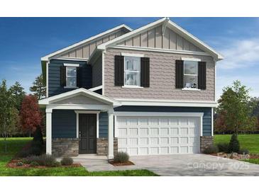 Charming two-story home with a two-car garage and beautifully designed facade at 154 Bellina Dr # 59, York, SC 29745