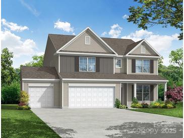 Charming two-story home featuring a three-car garage, neutral siding, and a well-manicured lawn at 2252 Tabor Rd # 575, Sherrills Ford, NC 28673