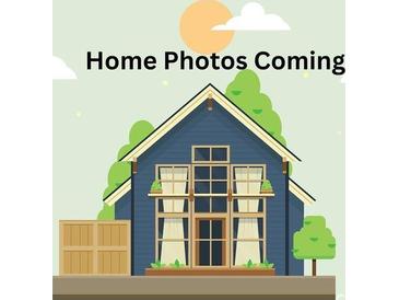 Illustration of a charming home exterior with large windows and a pleasant color scheme at 32537 Buchanan Ln, Albemarle, NC 28001