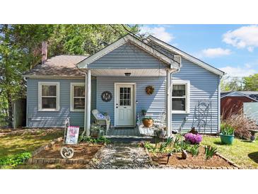 Charming bungalow featuring a covered front porch, landscaped yard, and inviting curb appeal at 608 Forney Ave, Lincolnton, NC 28092