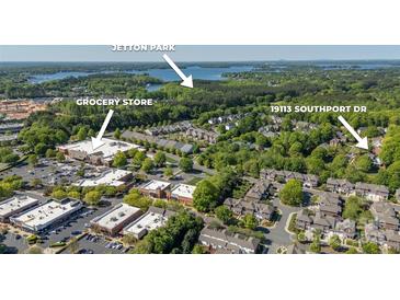 An aerial view shows 19113 Southport Dr near Jetton Park and a grocery store at 19113 Southport Dr, Cornelius, NC 28031