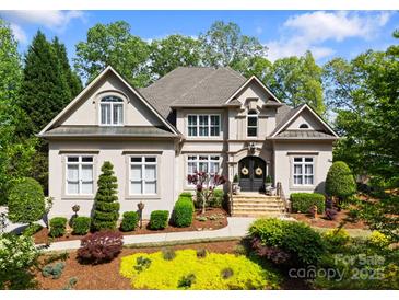 Beautiful home with manicured landscaping, stone accents, and a grand entrance at 1328 Astoria Pkwy, Catawba, NC 28609