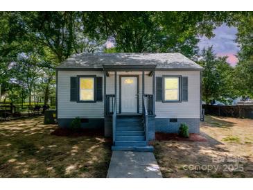 Charming single-story home with gray siding, contrasting trim, and inviting front steps at 111 Quinn Ave, Gastonia, NC 28054