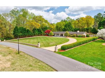 Stunning home with meticulously landscaped front yard and circular driveway at 316 Country Club Acres None, Shelby, NC 28150