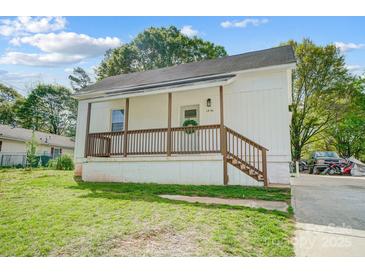 Charming single-story home with a cozy front porch and well-maintained lawn at 1901 Parkdale Ave, Gastonia, NC 28052