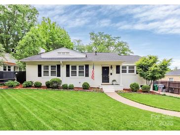 Charming single-story home with a well-manicured lawn and inviting curb appeal at 3510 Conway Ave, Charlotte, NC 28209