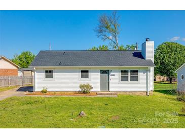 Charming single-story home with a well-maintained lawn and classic white siding at 1153 Doris Ct, Rock Hill, SC 29730