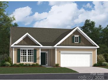 Charming one-story home featuring a two-car garage, complemented by mature trees, a well-manicured lawn, and tasteful green shutters at 2820 Morning Song Way, Lancaster, SC 29720
