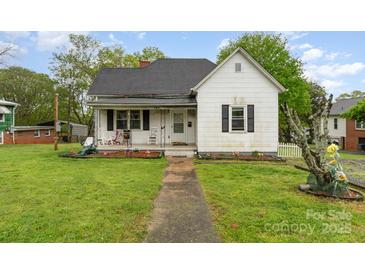 Charming home featuring a cozy front porch and inviting landscaping at 745 6Th Sw Ave, Hickory, NC 28602