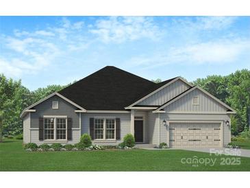 Charming single-Gathering home featuring a two-car garage and well-manicured landscaping at 184 Swann Rd # 1, Statesville, NC 28625