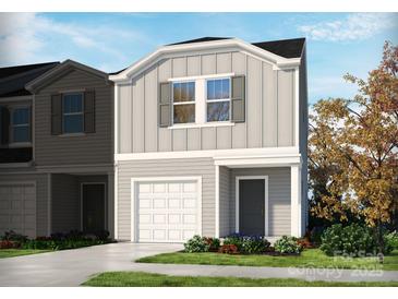 Charming two-story home with gray siding, one-car garage, and a welcoming front door at 3790 Backwater St, Concord, NC 28027
