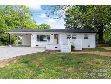 Charming, freshly painted single-story home with a covered carport and welcoming front porch at 1341 Hopewell Rd, Rock Hill, SC 29730