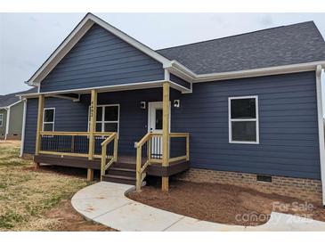 Charming home with a welcoming porch and well-maintained landscaping at 528 Waco Rd, Kings Mountain, NC 28086