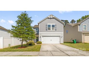 Charming two-story home with gray siding, white trim, and a two-car attached garage at 3119 Auten Ave, Charlotte, NC 28269