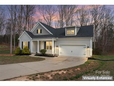 Charming single-Gathering home showcasing gray siding, black shutters, and an attached two-car garage at 1870 Beth Haven Church Rd, Denver, NC 28037