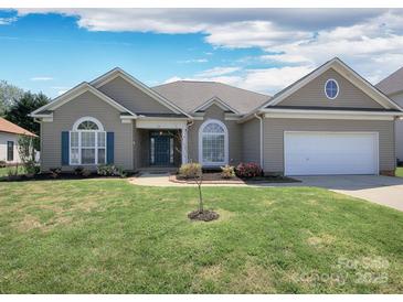 Charming single-story home with well-manicured lawn, blue shutters, and inviting curb appeal at 126 Dairy Farm Rd, Mooresville, NC 28115