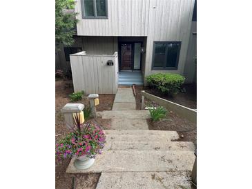 Inviting front entrance with concrete stairs and walkway leading to the door at 58 Ridgeport Rd, Clover, SC 29710