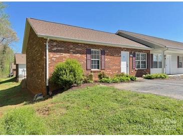 Charming brick home with a well-maintained lawn and inviting curb appeal at 117 24Th Nw St # 41, Hickory, NC 28601