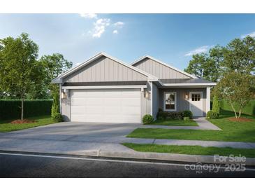 Charming single-story home with gray siding, white trim, a two-car garage, and landscaped front yard at Lot 1 Scoggins St, Rock Hill, SC 29730