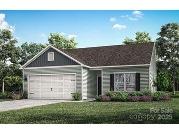 Inviting single-story home with a two-car garage and a well-maintained front lawn at 3330 Strong Box Ln, Gastonia, NC 28052