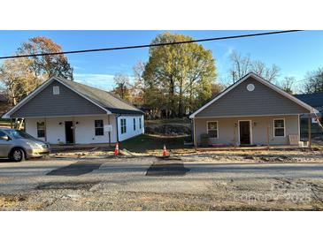 Charming new construction homes featuring craftsman-style exteriors, inviting front porches, and shaker siding at 1713 N Clay St, Salisbury, NC 28144