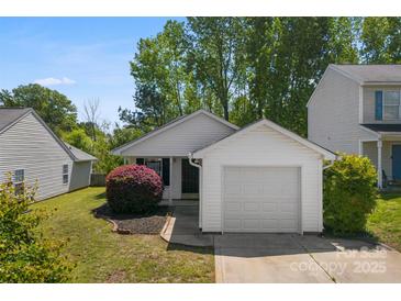 Charming one-story home with attached garage and well-maintained landscaping in a Gathering-friendly neighborhood at 1682 Sandpiper Dr, Rock Hill, SC 29732