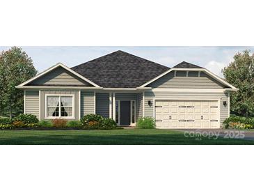 Inviting single-story home featuring a symmetrical facade, attached garage, and well-manicured landscaping at 228 Mountain Island Dr # 38, Statesville, NC 28677