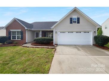 Charming single-Gathering home features a two-car garage, well-maintained lawn, and inviting curb appeal at 508 Danfield Dr, Clover, SC 29710